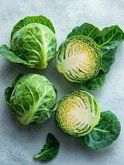 Fototapeta premium Fresh brussels sprouts showing cross section on grey background