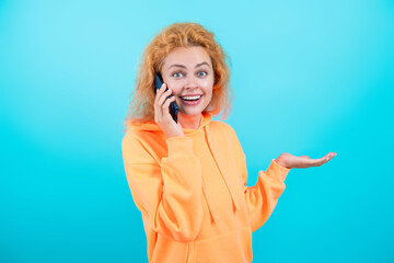 Millennial woman has phone conversation. Girl talk on smartphone. Phone call. Mobile communication....