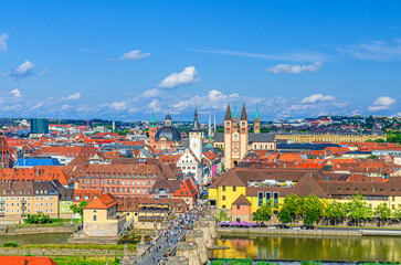 Obraz premium Wurzburg cityscape, aerial view of Wurzburg old town with Old Main Bridge, Main river, Saint Kilian Cathedral, Neumunster and Chapel Saint Mary Wurzburg city historical center, Bavaria state, Germany