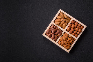Wooden box with four sections filled with nuts