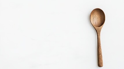 rustic wooden spoon rests gracefully on pristine white background capturing essence of homemade culinary artistry and