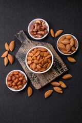 Roasted or raw peeled almonds in bowl