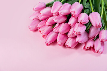 Mothers day, Valentines Day, Birthday celebration concept. Greeting card. Beautiful Bouquet of pink delicate tulips. Copy space for text, top view. Spring background. March 8, International Womens Day
