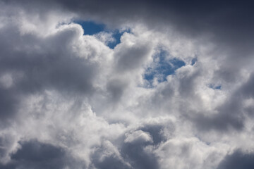 Grey leaden dramatic clouds in the sky.