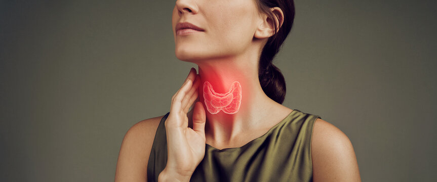 Woman's neck with highlighted thyroid gland, showcasing medical concept of thyroid health, anatomy, or disease awareness