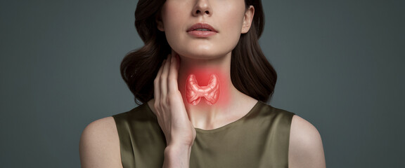 Close-up of woman's neck, showcasing highlighted thyroid gland, illustrating health condition, medical information or awareness campaign