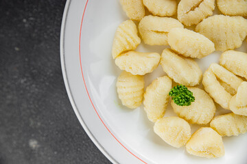 Gnocchi tasty fresh gourmet food background table rustic food top view copy space keto and paleo diet vegetarian and vegan food