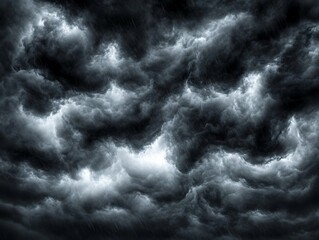 Dark ominous stormy clouds with falling rain creating a gloomy atmosphere