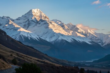 Fototapeta premium Snow-capped mountain peaks in the morning light.