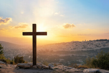 Wooden cross on a on a rocky hill with a sunrise backdrop. Religious symbol and divine light. Concept for faith, spirituality, Christianity, hope, peace.