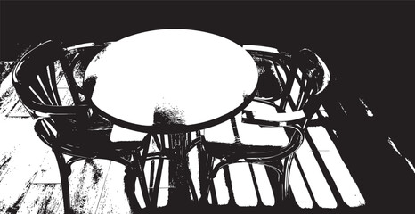 Round table and chairs in bright sunlight