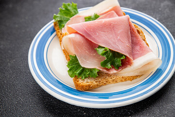 Sandwich ham tasty fresh gourmet food background on table rustic food top view copy space