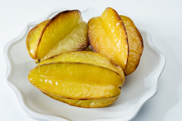 Ripe fresh averrhoa carambola or star fruits on board