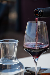 Wine making on bodegas wineries on volcanic soils of Mount Teide in Tacoronte-Acentejo wine region on Tenerife, Canary islands vacation, Spain, tasting of red listan negro grape wine