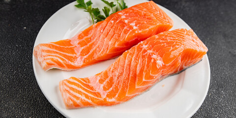 Salmon red fish organic seafood tasty fresh gourmet food background on table rustic food top view copy space
