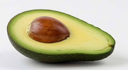 Ripe avocado half showing seed fresh healthy green fruit eat food diet meal shot plant vegan color