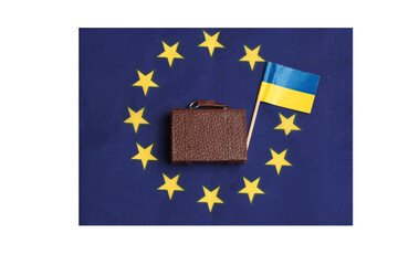 suitcase with ukrainian flag and eu flag.concepts of ukraine's desire to join the eu