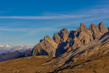 Dolomite Alps mountains in Europe beautiful landscape photo. Stunning rocky peaks of Dolomiti Alps under clear blue sky cliffs and climbing walls of European Alps scenic view