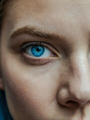 Fototapeta premium Close-up portrait of a woman with blue eyes