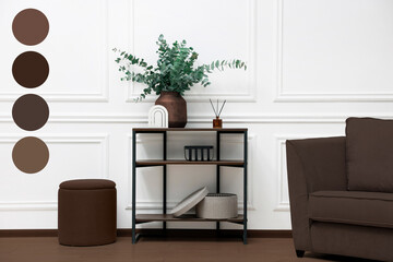 Stylish living room with console table and other furniture in mocha mousse shade. Interior design with matching color palette