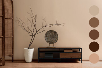 Stylish living room in mocha mousse shade with console table and decorative elements. Interior...