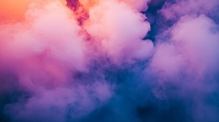 Fototapeta premium A dynamic cloud of various hues of smoke dances against a dark setting, suggesting a nebula or an abstract explosion