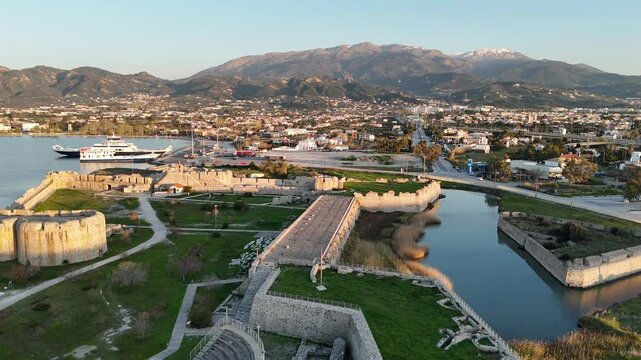 Sunset aerial view of Venecian fortress Rio castle in Greece, near Rio-Antirio Bridge crossing Corinth Gulf strait, Peloponnese, Greece