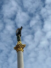 Fototapeta premium Kyiv statue church sky Beautiful