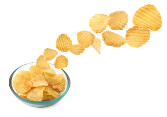 Tasty potato chips falling into bowl on white background