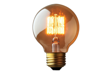 Glowing incandescent lightbulb with spiral filament on black, cut out transparent