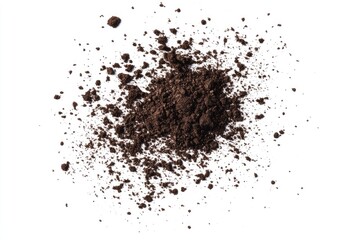 Scattered brown powder on white background