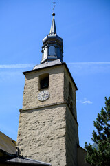 The St. Michael Catholic Church clock tower in Chamonix Mont Blanc, France.