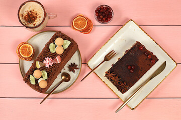 Concept of modern bakery, festive treat. Homemade delicious tiramisu, sponge cake or cake with sweet jam, cream, nuts, cinnamon and milk drink eggnog with cocoa. And advertising for cafe 