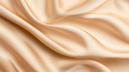 Fototapeta premium Elegant Close-Up of Flowing Silk Texture in Soft Cream Color on Fabric Background