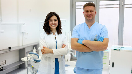 Obraz premium Portrait of a happy team of successful dentists