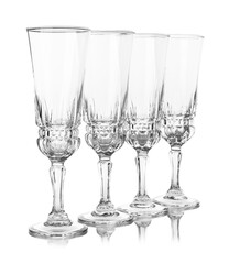 Many empty clean glasses isolated on white