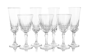 Many empty clean glasses isolated on white