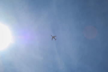 Passenger Airplane Flying High in Sky