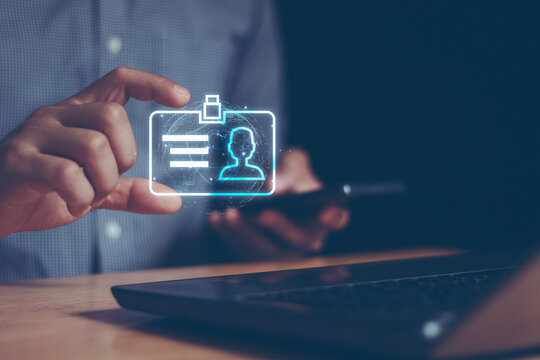 Businessman hand holding digital ID profile information card for modern business authentication digital identity privacy concept. Cyber security, secure internet access, data protection in the world. - Powered by Adobe