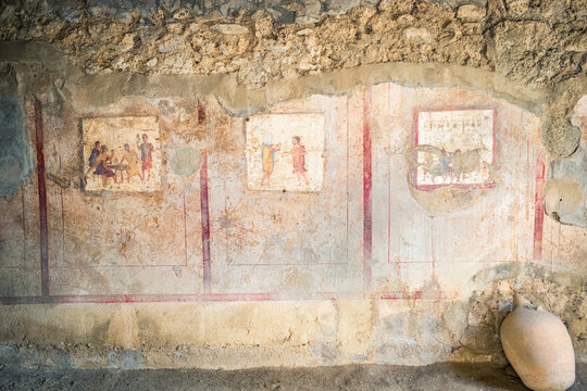 Ancient Frescoes on Wall in Pompeii Ruins, Italy with Historic Details