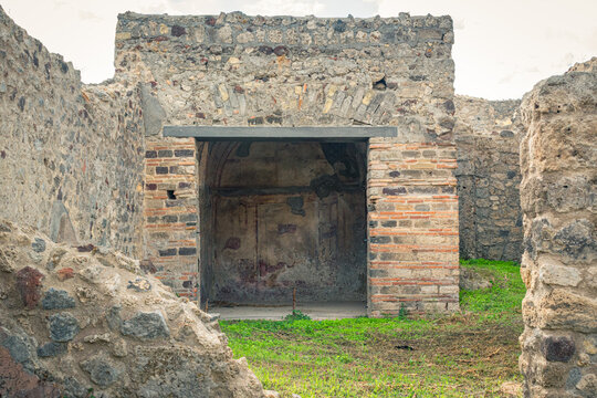 Ancient Stone Structure with Archway in Pompeii, Italy