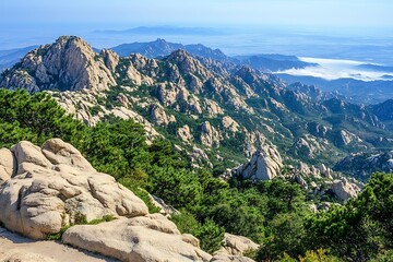 Obraz premium Mountaintop Vista: Scenic Granite Peaks & Valley.