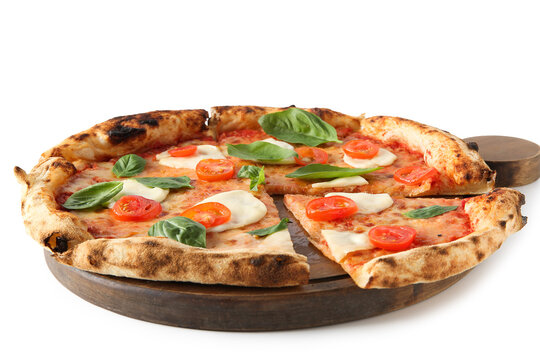 Wooden board with cut tasty pizza Margarita on white background