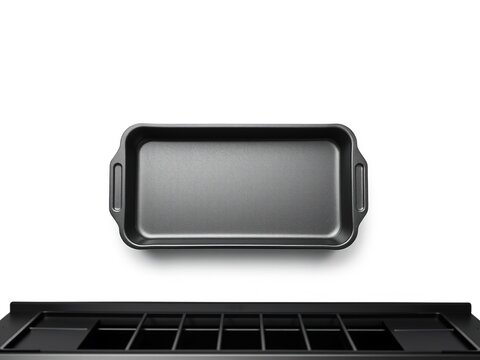 Black Baking Tray in Oven, Top View on White