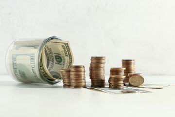 Golden coins with dollars on grunge beige background