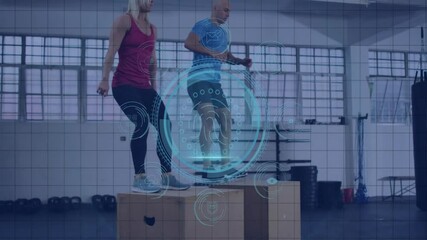 People exercising with digital fitness data animation overlay in gym setting - Powered by Adobe