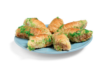 Plate with sweet baklava on white background. Ramadan celebration