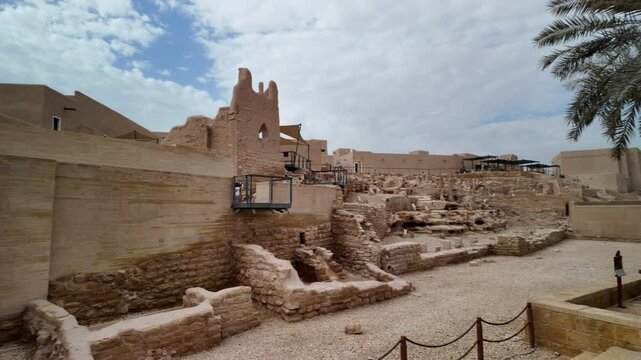 Diriyah, a UNESCO World Heritage site near Riyadh, featuring restored mud-brick buildings and modern structures blending history and culture of Riyadh, Saudi Arabia