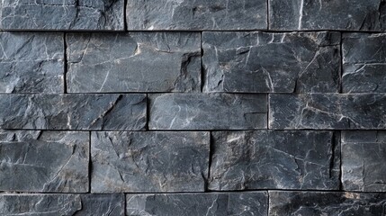 Detailed texture of grey stone tiles showcasing natural grains.