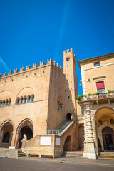 Fototapeta premium Beautiful ancient Cavour Square and Palazzo dell'Arengo in Rimini, Italy in summertime